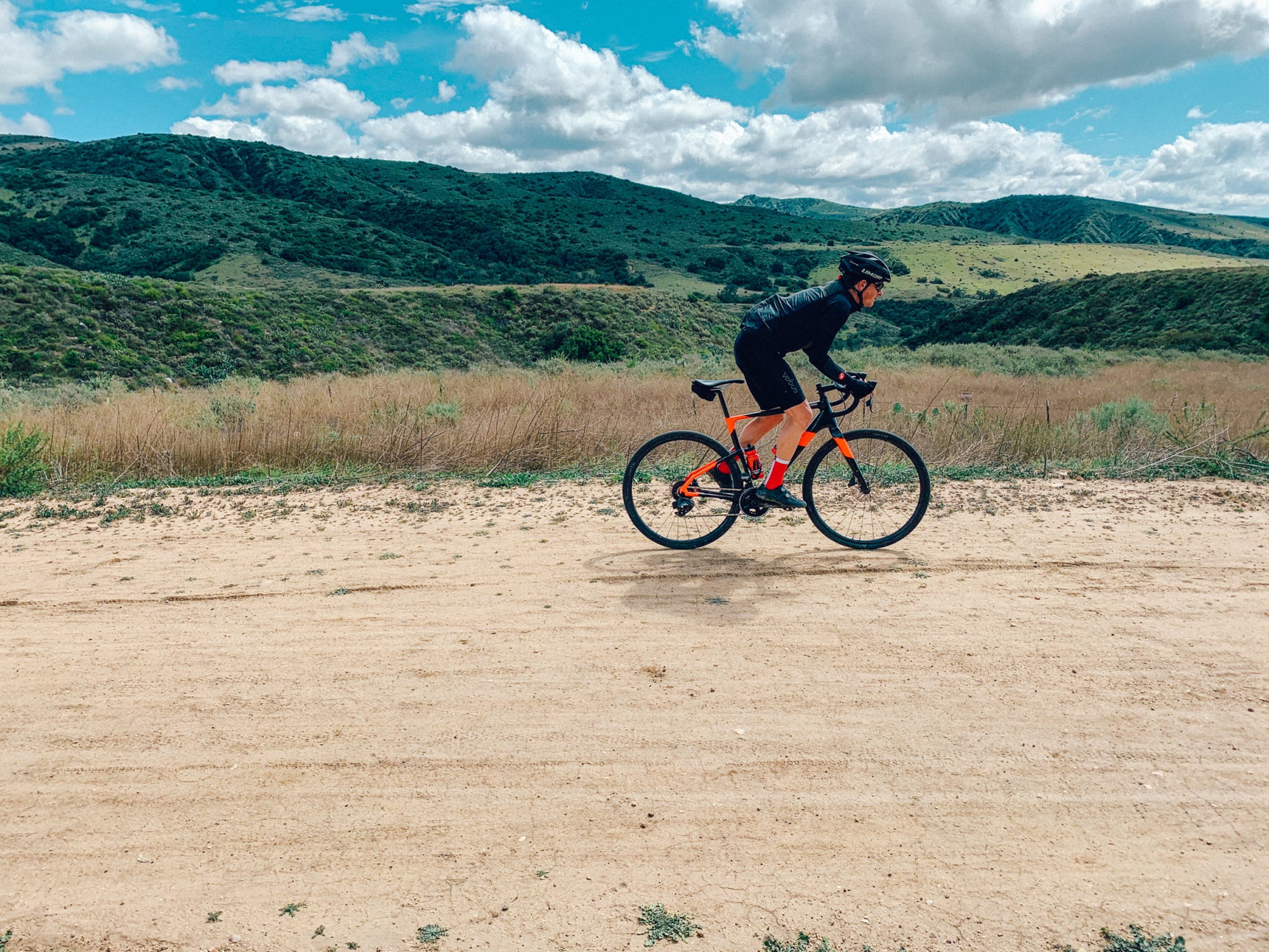 cyclist rides a gravel trail through o'neil park